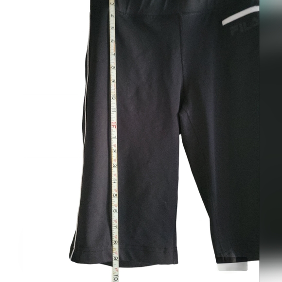 Nike women's running short. Black with white stripe down side of each leg. - Picture 3 of 6